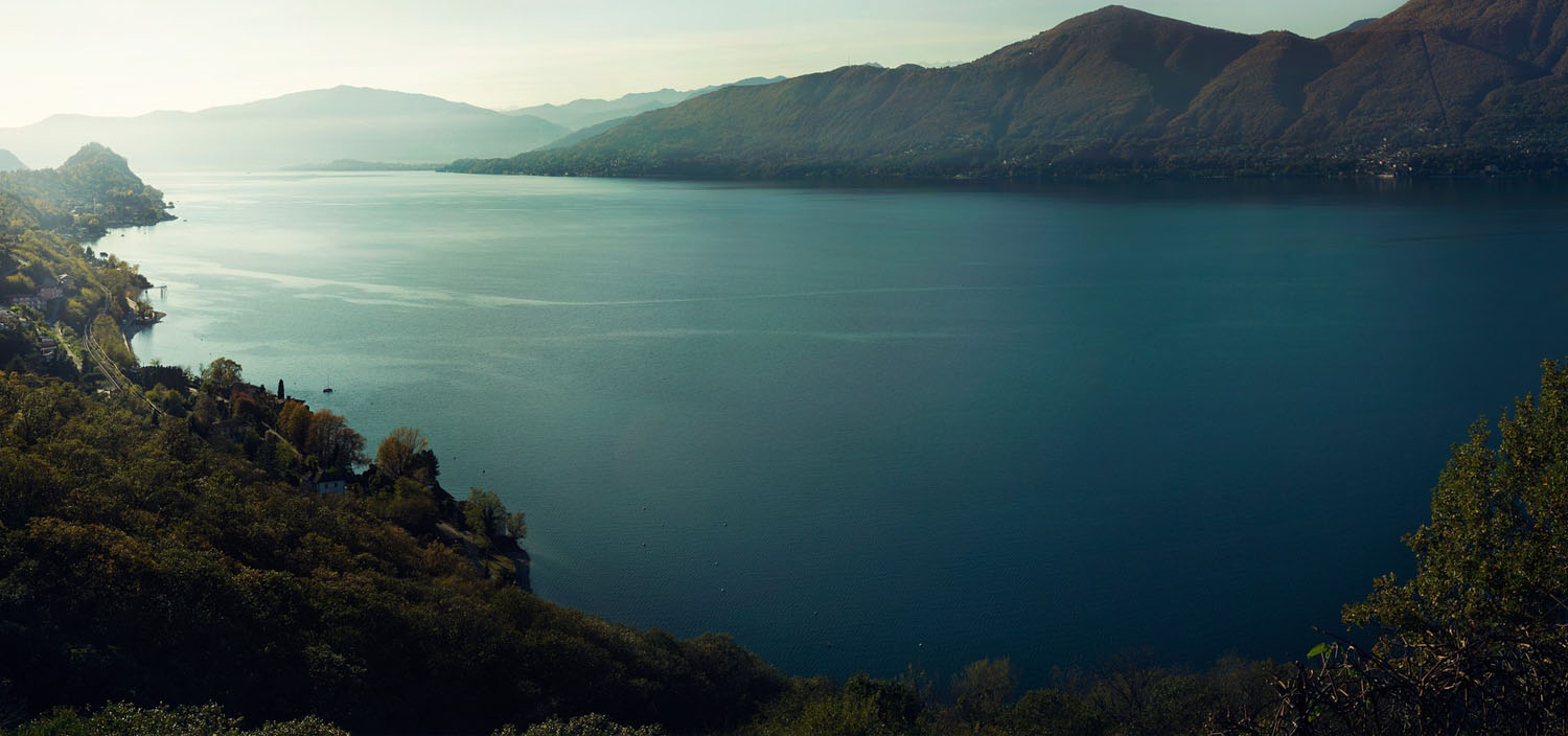 A Marlborough Sounds yacht charter view of the still ocean and cliff faces